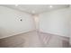 Spacious bedroom featuring neutral carpet and walls, illuminated by recessed lighting at 2222 Flower Blossom Ave, Brighton, CO 80601
