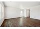 Bright, spacious room with wood-look flooring, large windows and ample natural light at 2222 Flower Blossom Ave, Brighton, CO 80601