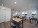 Open-concept living space with kitchen, dining, and living areas, perfect for entertaining and Gathering living at 13583 E 103Rd Ave, Commerce City, CO 80022