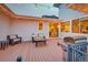Cozy back deck featuring patio furniture, a grill, and string lights for a relaxing evening at 15818 W 95Th Ave, Arvada, CO 80007