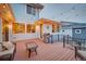 Back deck with patio furniture, grill, and string lights for entertaining at 15818 W 95Th Ave, Arvada, CO 80007