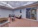 Cozy patio with string lights, comfortable seating, and a barbecue grill at 15818 W 95Th Ave, Arvada, CO 80007