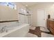 Bathroom features a glass-enclosed shower and bathtub, perfect for relaxation at 3081 Youngheart Way, Castle Rock, CO 80109