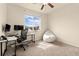 Bright bedroom with a desk, a beanbag, a window, and carpet flooring at 3081 Youngheart Way, Castle Rock, CO 80109