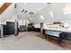 Large bonus room features a foosball table, climbing rings, and a punching bag at 7225 Box Canyon Rd, Sedalia, CO 80135