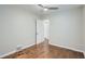 Empty bedroom with hardwood floors, neutral paint, and a ceiling fan at 3356 Quivas St, Denver, CO 80211