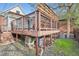 Exterior view of the deck with metal railings and a view of the backyard at 3356 Quivas St, Denver, CO 80211