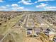 A high angle shows houses aligned neatly in a neighborhood at 24222 E Canyon Pl, Aurora, CO 80016
