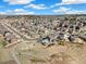 Expansive aerial view of a suburban neighborhood featuring well-maintained homes and landscaped yards at 24222 E Canyon Pl, Aurora, CO 80016