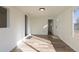 Spacious and sunny living room with new vinyl plank flooring at 1435 Jay St, Lakewood, CO 80214