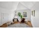 Bright bedroom featuring a play area and plenty of natural light at 685 N Emerson St, Denver, CO 80218