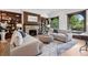 Elegant living room with a fireplace, built-in bookshelves, and comfortable seating at 685 N Emerson St, Denver, CO 80218