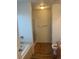 Clean bathroom featuring a shower, bathtub, and a toilet with modern fixtures and tile accents at 2170 Granite Dr, Brighton, CO 80603