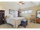 Comfortable bedroom with plush carpeting, ample natural light, and stylish furniture at 4061 Nordland Trl, Castle Rock, CO 80109