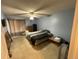 Bedroom with carpeted floors, ceiling fan, and a window with curtains at 21300 E 42Nd Ave, Denver, CO 80249