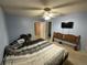 Bright bedroom with neutral walls, ceiling fan, and carpeted floors at 21300 E 42Nd Ave, Denver, CO 80249