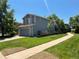 Charming home with a landscaped yard, attached garage, and inviting curb appeal at 21300 E 42Nd Ave, Denver, CO 80249