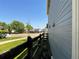 Picturesque side yard featuring a wooden fence and tree-lined street views at 21300 E 42Nd Ave, Denver, CO 80249