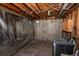 Unfinished basement with exposed ceiling and concrete walls, washer and dryer included at 415 Winona Ct, Denver, CO 80204