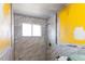 Bathroom with shower, tiled walls, needing updates at 415 Winona Ct, Denver, CO 80204