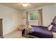 This cozy bedroom features a comfortable bed, soft lighting, and a cheerful decor at 66 Yank Way, Lakewood, CO 80228