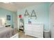 This bedroom has a ceiling fan, ample closet space, and bright lighting at 66 Yank Way, Lakewood, CO 80228
