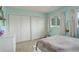 This light and airy bedroom features bright walls and carpet floors at 66 Yank Way, Lakewood, CO 80228