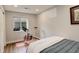 Bedroom featuring exercise bike, kettlebells, and neutral decor at 66 Yank Way, Lakewood, CO 80228