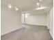 Bright basement with carpet, recessed lights, and natural light for a comfortable living space at 5225 Beech St, Arvada, CO 80002
