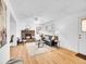 Bright living room with fireplace, hardwood floors and lots of natural light at 5225 Beech St, Arvada, CO 80002