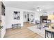 Bright living room features a cozy fireplace and neutral decor at 5225 Beech St, Arvada, CO 80002