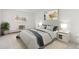 Bright bedroom with a cozy bed, modern decor, and a large window at 3470 S Poplar St # 102, Denver, CO 80224