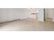 Inviting living room with new flooring, fresh paint, and lots of natural light at 3470 S Poplar St # 102, Denver, CO 80224