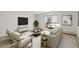 Bright living room with balcony access, stylish furniture, modern decor, and a serene atmosphere at 3470 S Poplar St # 102, Denver, CO 80224