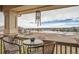 Cozy balcony with seating featuring views of the surrounding community at 7892 S Country Club Pkwy, Aurora, CO 80016