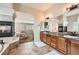 Large primary bathroom with fireplace, double sinks, tub, and shower at 7892 S Country Club Pkwy, Aurora, CO 80016
