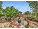 Outdoor patio with a fire pit and cozy seating arrangement at 6051 Ivanhoe St, Commerce City, CO 80022