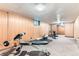 Basement with carpeted floors and gym at 6051 Ivanhoe St, Commerce City, CO 80022