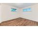 Bright bedroom with hardwood floors and natural light at 6051 Ivanhoe St, Commerce City, CO 80022