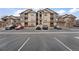 Exterior view of this residential building with covered balconies and parking at 7483 S Quail Cir # 626, Littleton, CO 80127
