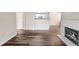 Spacious living room features hard surface floors and a fireplace at 7483 S Quail Cir # 626, Littleton, CO 80127