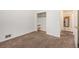 A simple bedroom, offering a peaceful retreat with plush carpeting and closet space at 7172 Kalamath St, Denver, CO 80221