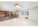 Spacious living area with a cozy fireplace, built-in shelving, and neutral tones at 7172 Kalamath St, Denver, CO 80221