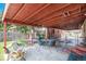 Covered patio with outdoor seating, perfect for entertaining at 7172 Kalamath St, Denver, CO 80221