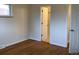 Bedroom with closet and access to an en-suite bathroom with tiled shower at 1152 S Eaton St, Lakewood, CO 80232
