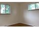 Bedroom with hardwood floors and large windows at 1152 S Eaton St, Lakewood, CO 80232