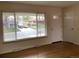 The home features beautiful hardwood floors and a large window at 1152 S Eaton St, Lakewood, CO 80232