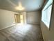 Large finished basement features neutral paint, carpeted floors, and a window for natural light at 22148 Red Hawk Ln, Golden, CO 80401