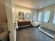 Luxurious bathroom with double vanity, soaking tub, and frameless glass shower at 22148 Red Hawk Ln, Golden, CO 80401