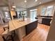 Modern kitchen featuring a large island, stainless steel appliances, and sleek cabinetry at 22148 Red Hawk Ln, Golden, CO 80401